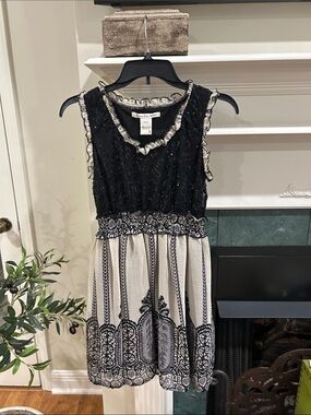 Sleeveless Black and Cream Ruffled Waist Dress